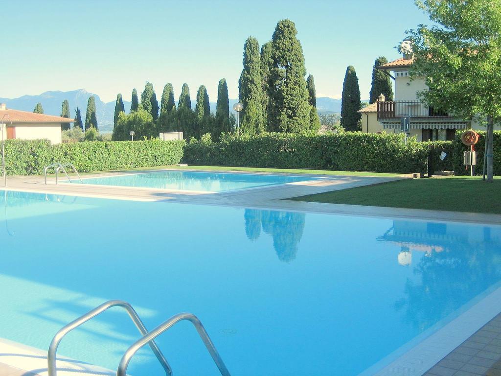 Belvilla By Oyo Enticing Holiday Home With Pool Lazise Eksteriør bilde